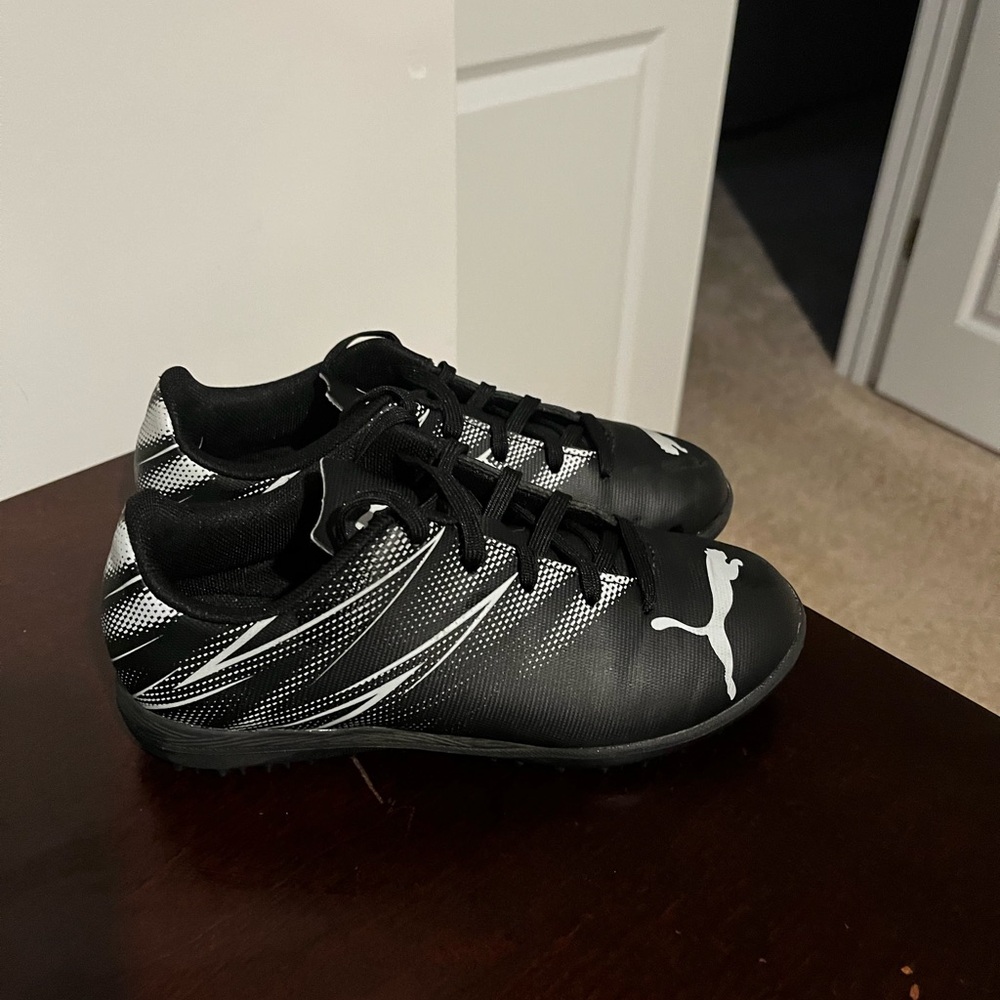 Kid Black and White Puma Soccer Cleats
